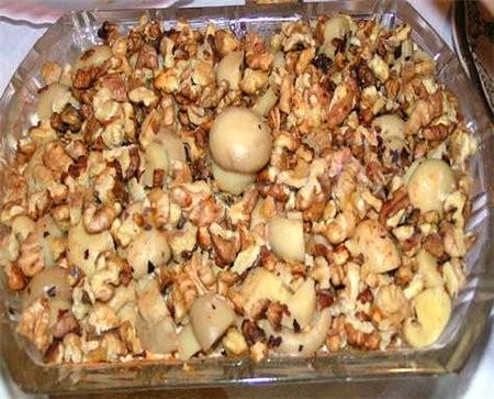 Mushroom salad with cheese and garlic sauce Nut tale