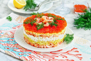 Salad with shrimp and red caviar