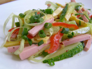 Salad with boiled sausage, hard cheese and fresh cucumber