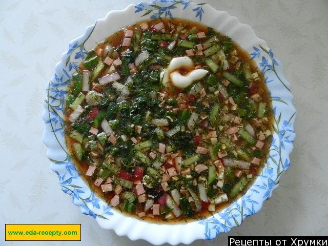 Okroshka with boiled sausage, potatoes and cucumbers on kvass