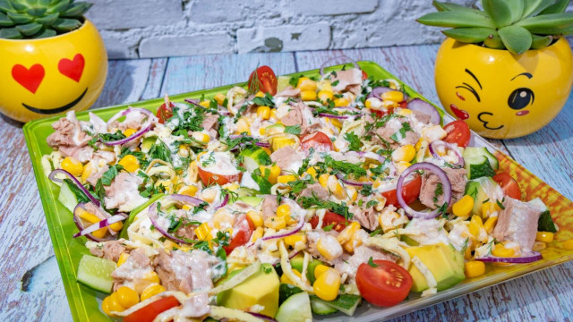 Tuna salad with avocado egg and corn