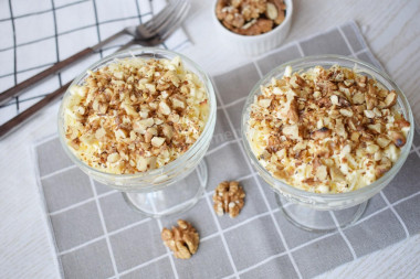 Portioned salad with chicken fillet, egg and cheese in cream