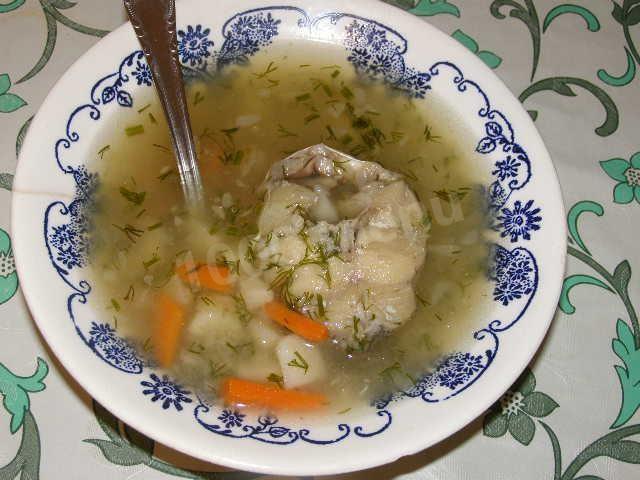 Cod and vegetable soup with sour cream and herbs