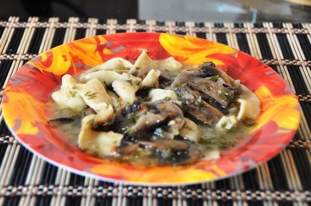 Fresh mushroom noodle soup with broth cube