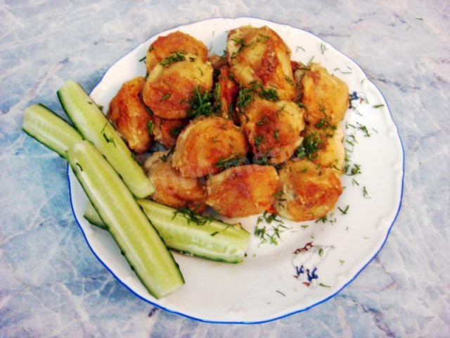 Dumplings, pan-fried and stewed in sour cream