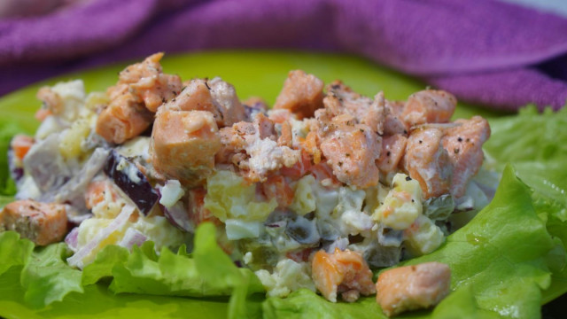 Unusual vegetable salad with salmon