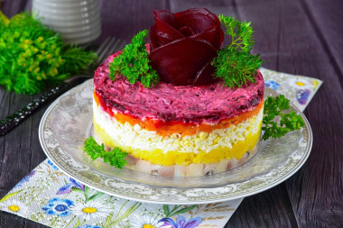 Herring under a fur coat with melted cheese