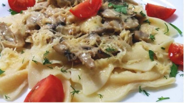 Homemade pasta farfalle in cream sauce