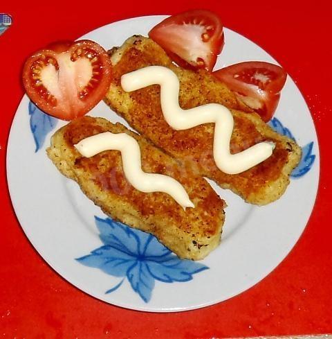 Potato sticks with hard cheese in breadcrumbs