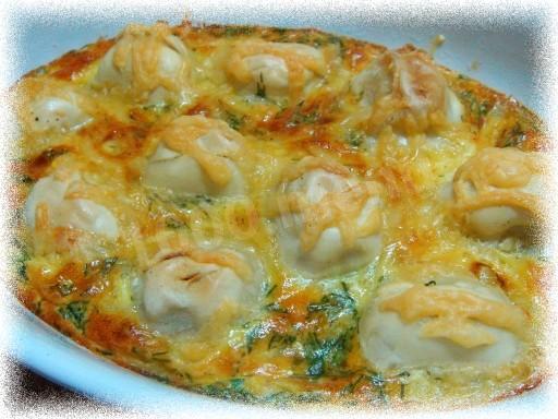 Dumplings with cheese in an omelet