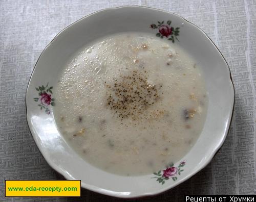 White chicken soup with melted cheese and potatoes with mushrooms