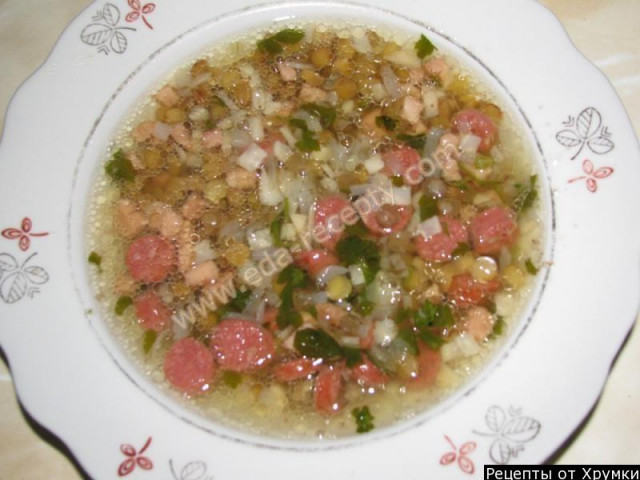 Hearty lentil soup with pork, sausage and roots