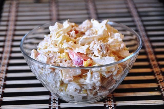 Chicken salad with Peking cabbage, corn and pineapples