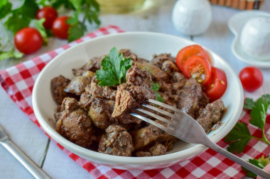 Chicken liver in a pan fried with onions