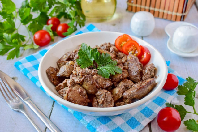 Chicken liver in a pan fried with onions