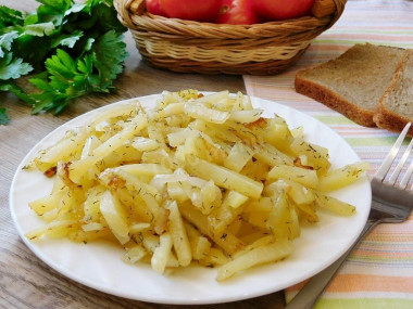 Fried potatoes with onions in a frying pan