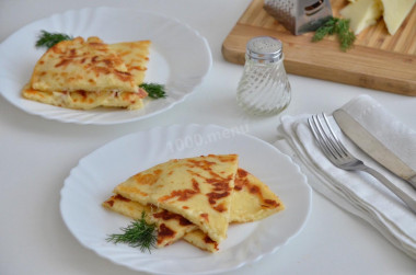 Lazy khachapuri with cheese on pan on kefir