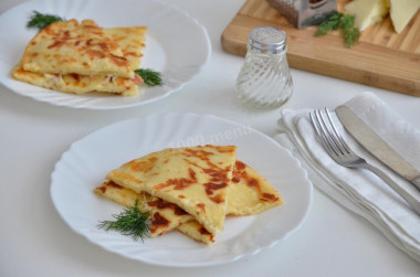 Lazy khachapuri with cheese on pan on kefir