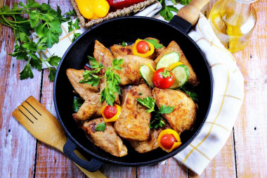 Chicken breasts with mayonnaise in a frying pan