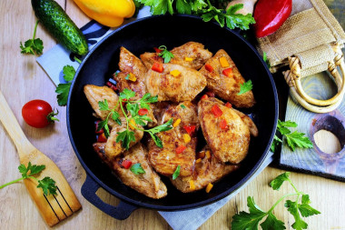 Chicken breasts with mayonnaise in a frying pan