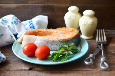 Fried salmon in a frying pan