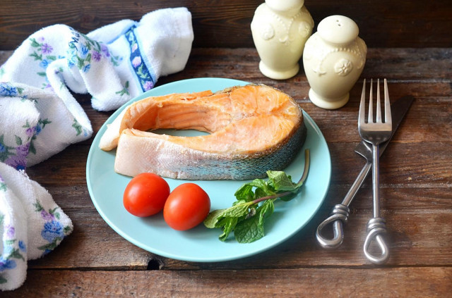 Fried salmon in a frying pan