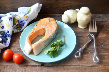 Fried salmon in a frying pan