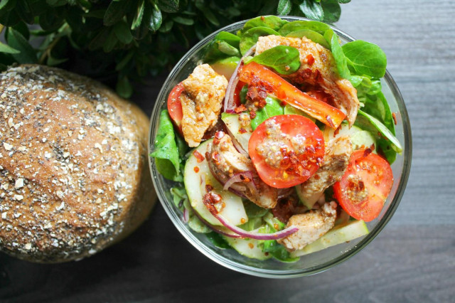 Salad with fried chicken breast and vegetables