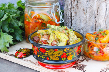 Fried potatoes with cabbage in a frying pan