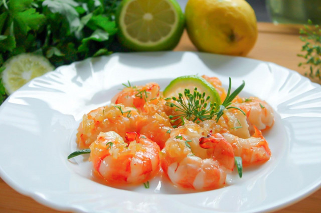 Fried king prawns in a frying pan