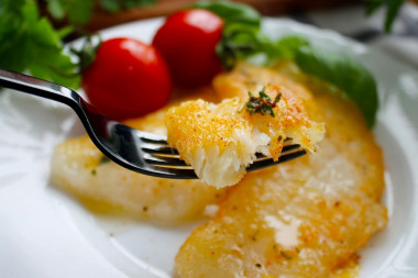 Halibut fillet fried in a frying pan