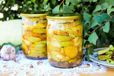 Fried zucchini with garlic for winter in jars