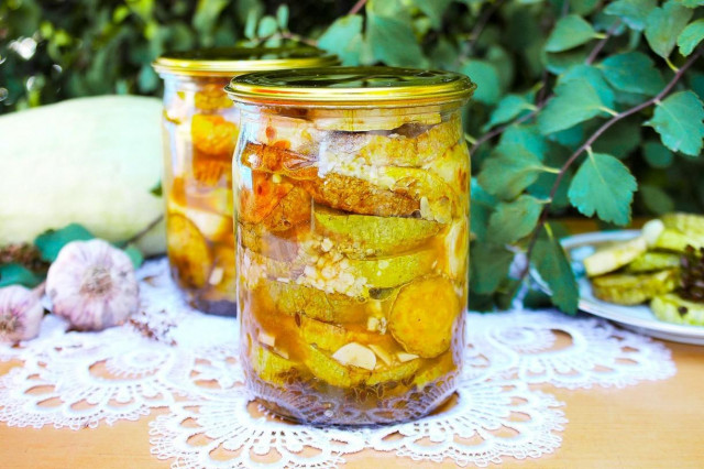 Fried zucchini with garlic for winter in jars