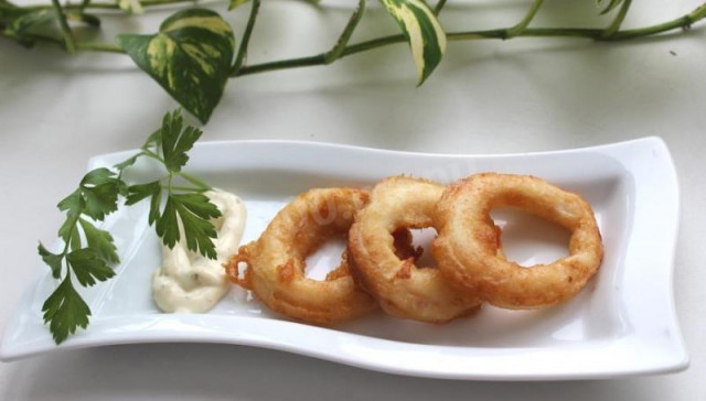 Fried squid rings in beer batter