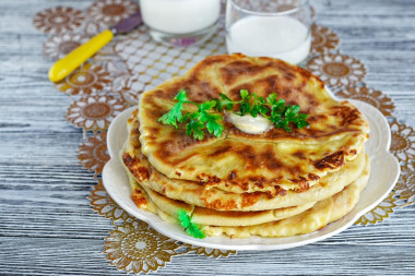 Fried khachapuri two Adyghe and hard cheeses