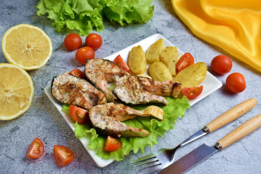 Grilled salmon in a frying pan