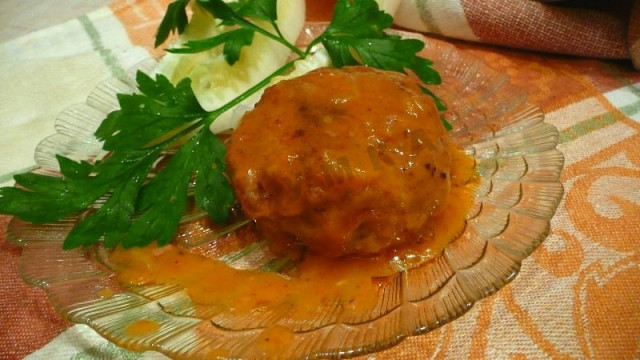 Fried cutlets and then baked with gravy