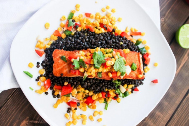 Salmon fried on black lentils