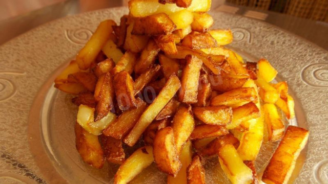 Potatoes fried in olive oil