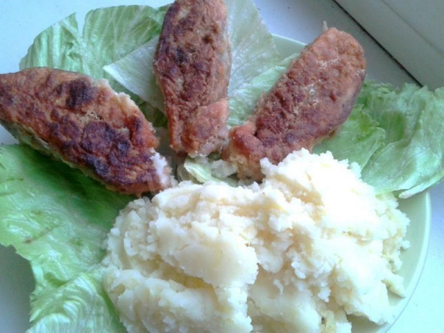 Pink salmon fried in pieces in flour