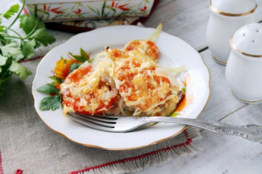 French meat with cheese and tomatoes in the oven