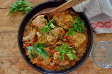 Classic Georgian chicken chakhokhbili in a frying pan