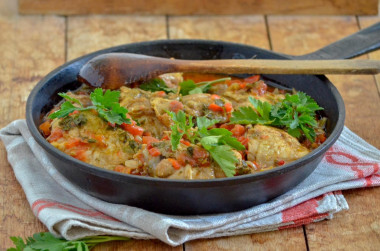 Classic Georgian chicken chakhokhbili in a frying pan