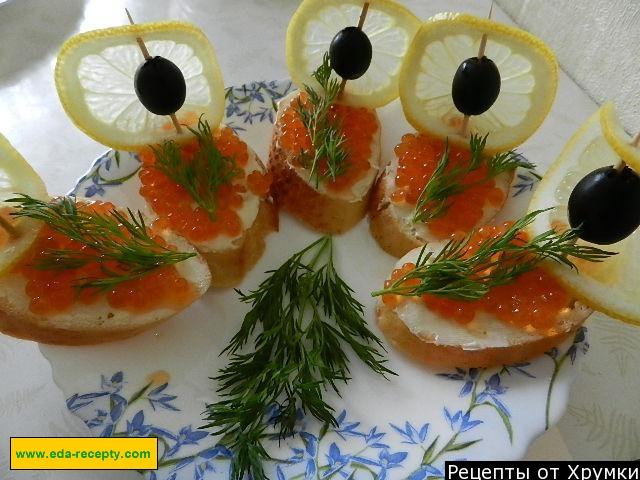 Sandwiches with red caviar Boats