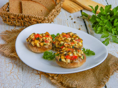 Mushrooms baked in the oven with cheese and garlic whole