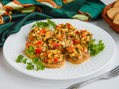 Mushrooms baked in the oven with cheese and garlic whole