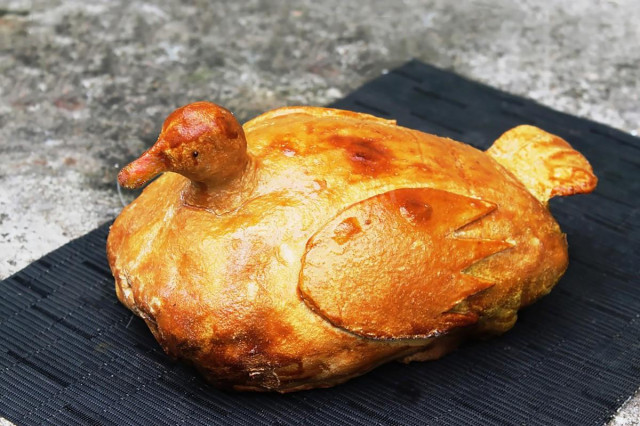 Duck in dough baked in the oven