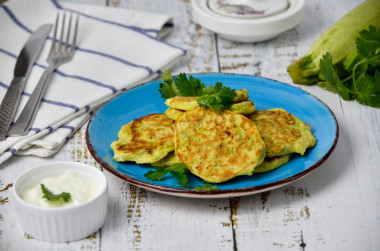 Zucchini fritters from zucchini in a frying pan