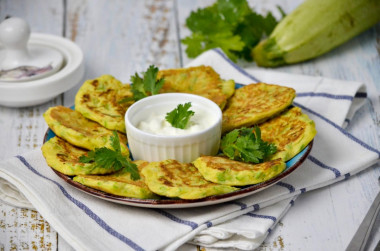 Zucchini fritters from zucchini in a frying pan