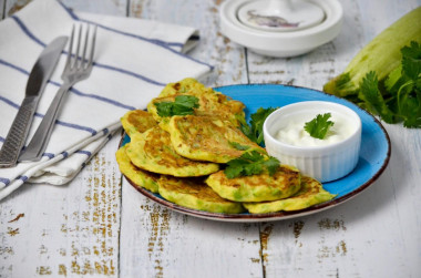 Zucchini fritters from zucchini in a frying pan